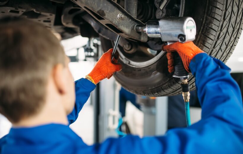 a man working on a car